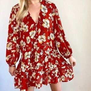 Emma and Michele dress long-sleeved, rust-colored with a floral pattern